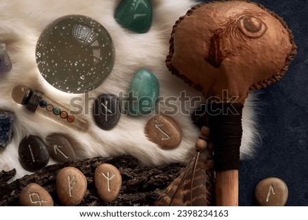 handmade stone runes on white fur
