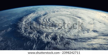 Super Typhoon, tropical storm, cyclone, hurricane, tornado, over ocean. Weather background. Typhoon,  storm, windstorm, superstorm, gale moves to the ground.  Elements of this image furnished by NASA. Royalty-Free Stock Photo #2398242711