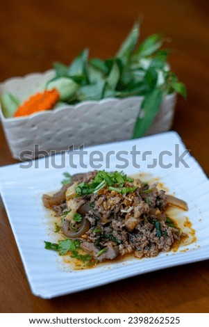 Northern Thai food, spicy minced pork salad (Larb Moo Kua)