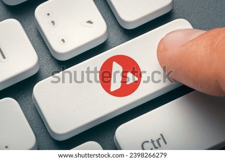 Cryptocurrency trading or exchange concept: Male hand index finger pressing computer key with Avalanche token logo.  Royalty-Free Stock Photo #2398266279