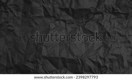 black crumpled paper texture background Royalty-Free Stock Photo #2398297793