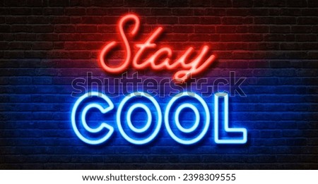 Neon sign on a brick wall - Stay cool