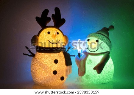 Toys snowman Light decorations glowing to merry christmas toy. 