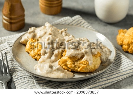 Homemade Southern Biscuits and Gravy for Breakfast Royalty-Free Stock Photo #2398373857