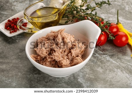 Canned tuna fillet with oil for salad Royalty-Free Stock Photo #2398412039