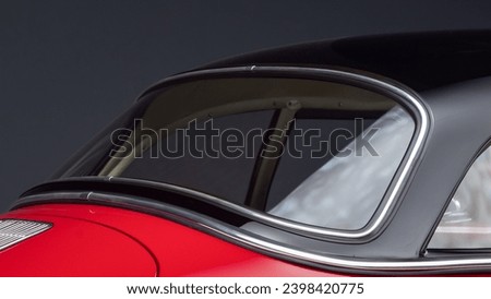 Back window on a sports car Royalty-Free Stock Photo #2398420775