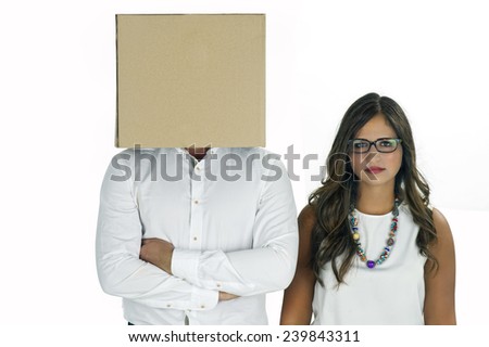 A man with a cardboard box covering his head and a woman