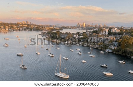 Sydney skyline and the Parramatta river from the Gladesville bridge at dusk.