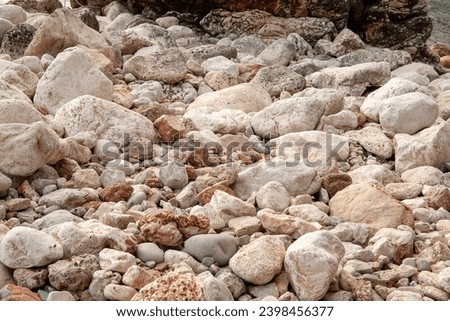 Stoney background, close-up. Stone landscape. Big pebbles for publication, poster, calendar, post, screensaver, wallpaper, post, card, banner, cover, website. High quality photography