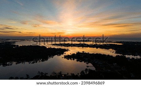 A gorgeous sunrise in the bay Royalty-Free Stock Photo #2398496869