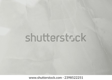 Grey marble background. Texture of stone slab. Ceramic tiles for finishing floor. Graphic abstract background. Ceramic countertop.