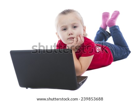 child at the computer on a white background
