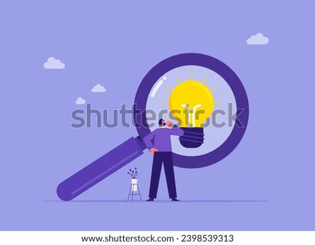 Analyze and choose best business idea concept, discover ideas, businessman looking at idea light bulb from magnifying glass Royalty-Free Stock Photo #2398539313