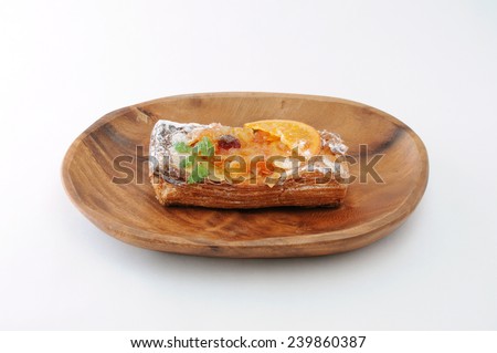 orange marmalade tart pie on wood plate white background