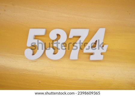 The golden yellow painted wood panel for the background, number 5374, is made from white painted wood.