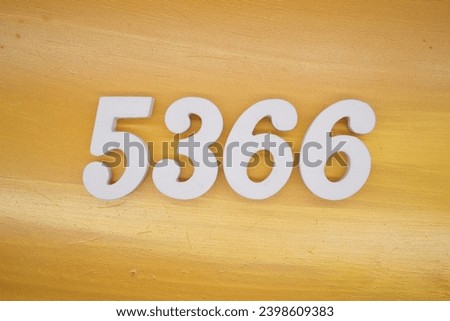 The golden yellow painted wood panel for the background, number 5366, is made from white painted wood.