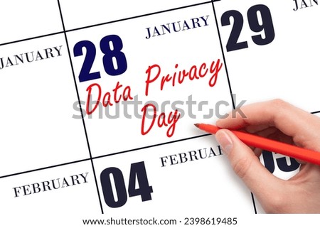 January 28. Hand writing text Data Privacy Day on calendar date. Save the date. Holiday.  Day of the year concept. Royalty-Free Stock Photo #2398619485