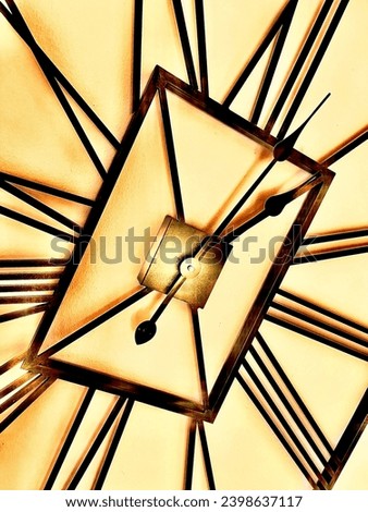 A manipulated photograph of a large square clock at an acute angle Royalty-Free Stock Photo #2398637117