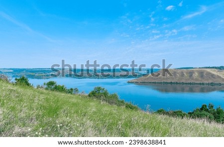 summer landscape green hills and river idyllic day time panoramic photography 