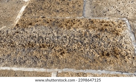Rough textured rectangular paving stones. Royalty-Free Stock Photo #2398647125