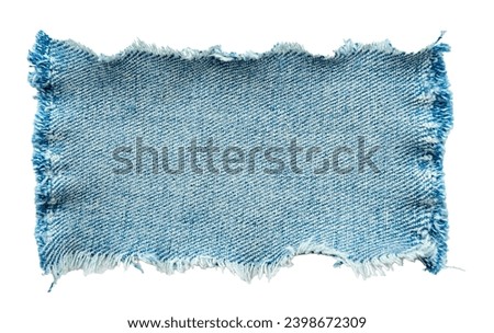 Piece of torn denim on a white background. Denim texture Royalty-Free Stock Photo #2398672309