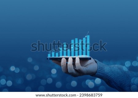 A man hold mobile phone with arrows pointing up showing graph as a symbol of growth and success or rising successful development and business development in the future