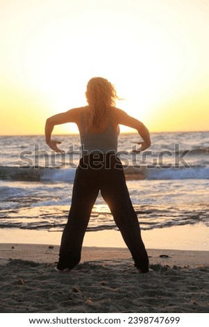woman meditation and yoga poses in the beach with sunrise