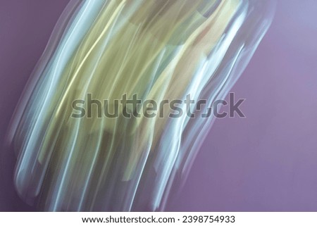 abstract blurred background with blue, violet, purple, white, pink, golden and silver electrical waves