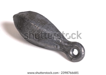 Lead fishing weights cast sinkers  isolated on white background. Equipment or tools. Heap of lead sinker weights for fishing, silver bullet bank accessories, close up Royalty-Free Stock Photo #2398766681