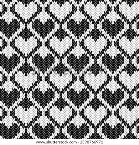 Heart shape jacquard knitted seamless pattern. Black and white Valentine background. Vector illustration. Royalty-Free Stock Photo #2398766971