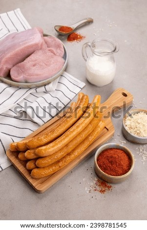 tender turkey sausages with paprika and cream composition with accessories side view