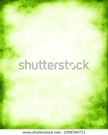 Green grunge watercolor background with frame and faded central area for your text or picture 