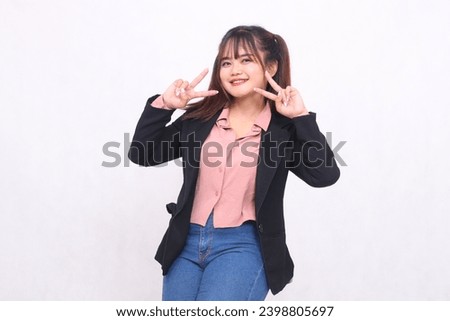 Beautiful Asian businesswoman in suit smile hand peace sign white background studio portrait for advertising materials,banners,billboards,job vacancies,business opportunities