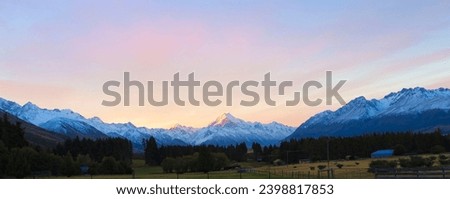 Banner travel of beautiful view with Aoraki Mount Cook and the road leading to Mount Cook Village. Taken during winter in New Zealand. Royalty-Free Stock Photo #2398817853