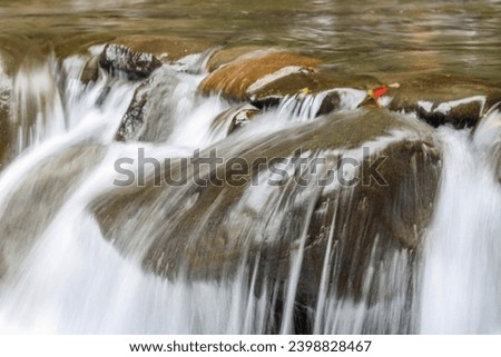 Closeup of rocks with flowing water, Long exposure photography
