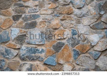 background of stone paving stones, paved sidewalk