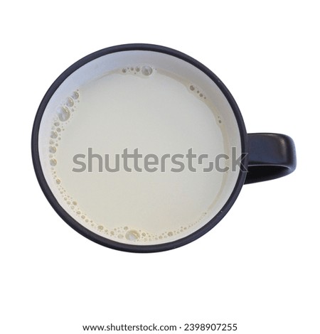 Top view the black mug of soy milk isolated on white background