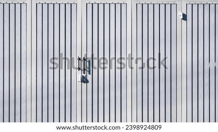 White wooden and steel folding entrance gate door background with hasp and stainless steel door handle in widescreen view Royalty-Free Stock Photo #2398924809