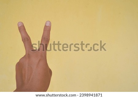 hand gestures that form signs or symbols