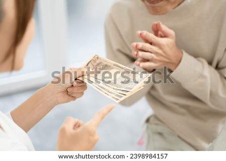 A scene where a husband asks his wife for more pocket money
