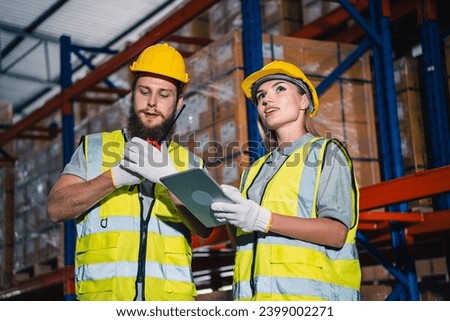 Female engineer using laptop computer for safety control checks or manufacturing maintenance work in factory building or construction site. woman engineer inspector working in industry product line