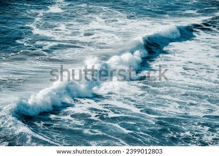 Big waves for surfer in Algarve