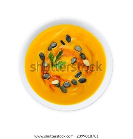 Pumpkin Soup, Tasty Homemade Pumpkin, Sweet Potato or Carrot Soup in a Bowl on White Isolated Background