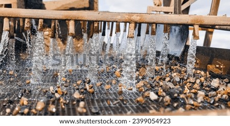 Sand quarry factory banner, Industrial plant with belt conveyor in open pit mining with Industry excavator on construction site. Royalty-Free Stock Photo #2399054923