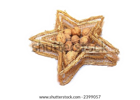 star shaped christmas ornament with nuts inside