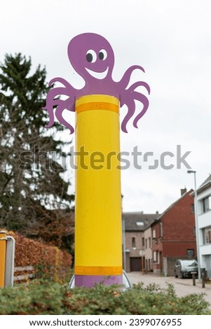 octopus road sign, information about a school nearby, octopus symbol of a school road, marking of Belgian streets near school,safe environment and school routes,30 maximum speed sign in school zone Royalty-Free Stock Photo #2399076955