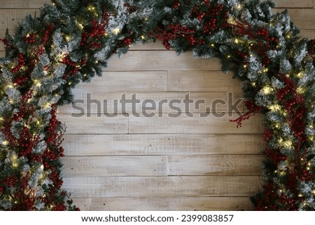 A garland of branches of a Christmas tree decorated for the new year
