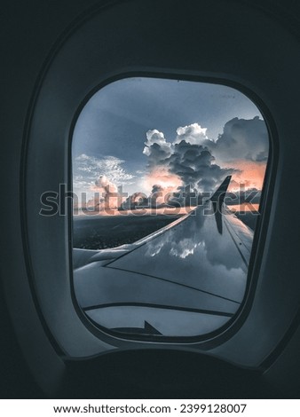 view of the sky from inside the aircraft cabin during a flight
