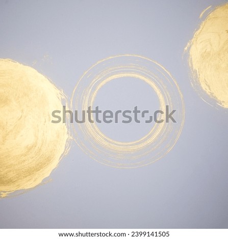 gold paint round in the white paper