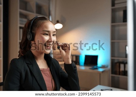 Beautiful Asian business woman wearing microphone headset, call center working in office, customer service representative, support center, help in headquarters, service work concept.